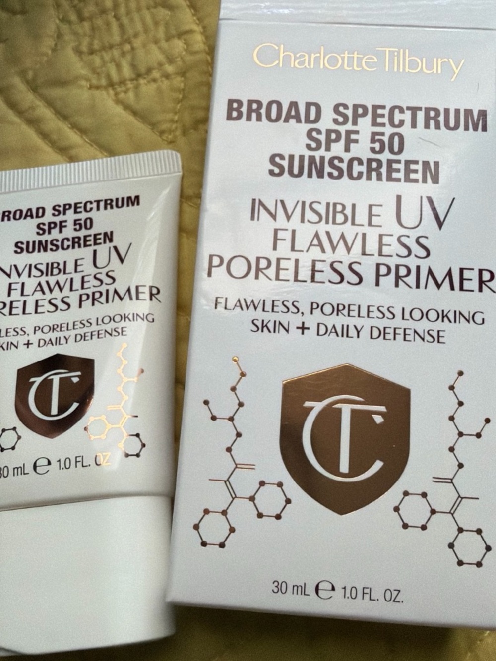 Charlotte Tilbury Invisible UV Flawless Poreless Primer - White & Gold